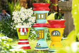 Birdbaths made from colourfully painted terracotta pots