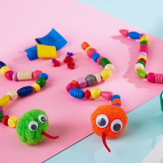 Snakes made from wooden beads