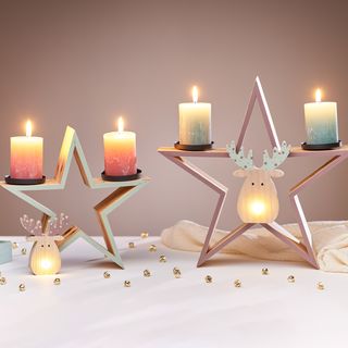 Star candle holder with decorative elks