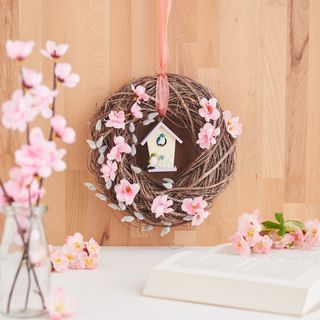 Krans met vogelhuisje