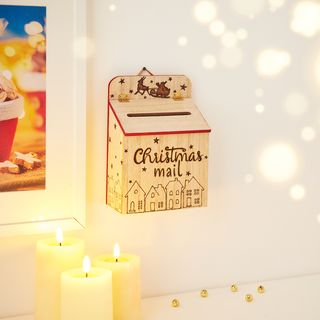 Een kerstbrievenbus brandschilderen